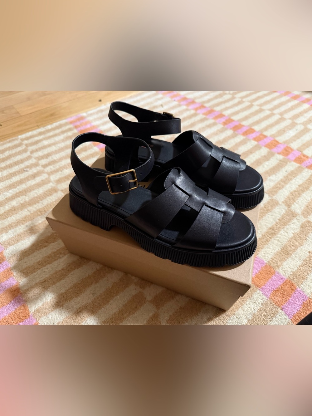 Charlotte Stone Black Woven Fisherman Sandals with Gold Buckle
